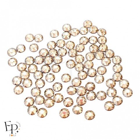 Strass Swarovski Golden Shadow 5 mm – finition cristalline et teinte dorée douce pour vêtements et personnalisation textile