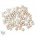 Strass Swarovski Golden Shadow 5 mm – finition cristalline et teinte dorée douce pour vêtements et personnalisation textile