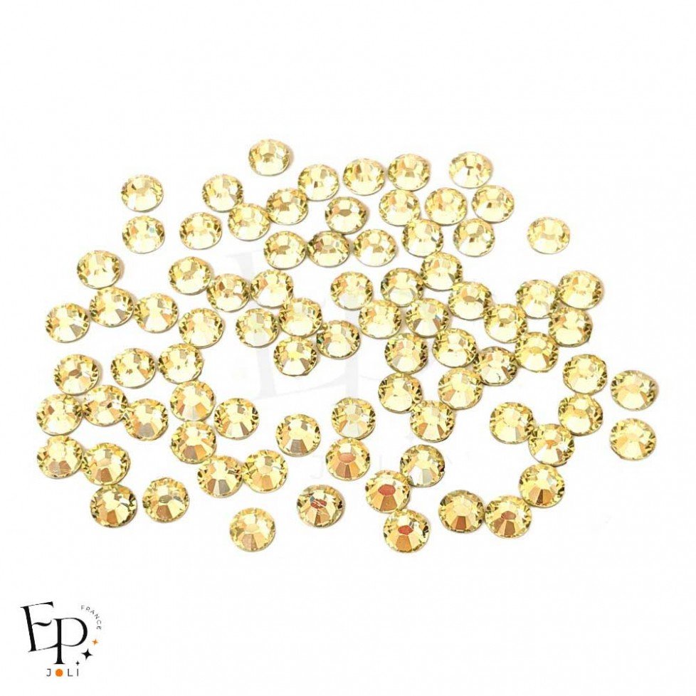 Strass Swarovski Jonquil 5 mm – brillance discrète et teinte citron givré Strass Swarovski Jonquil 5 mm – brillance discrète et teinte citron givré