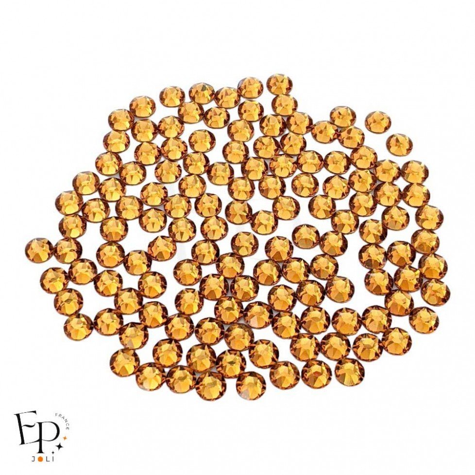 Strass Swarovski Topaz thermocollant 4 mm – brun doré intense et chaleureux Strass Swarovski Topaz thermocollant 4 mm – brun doré intense et chaleureux